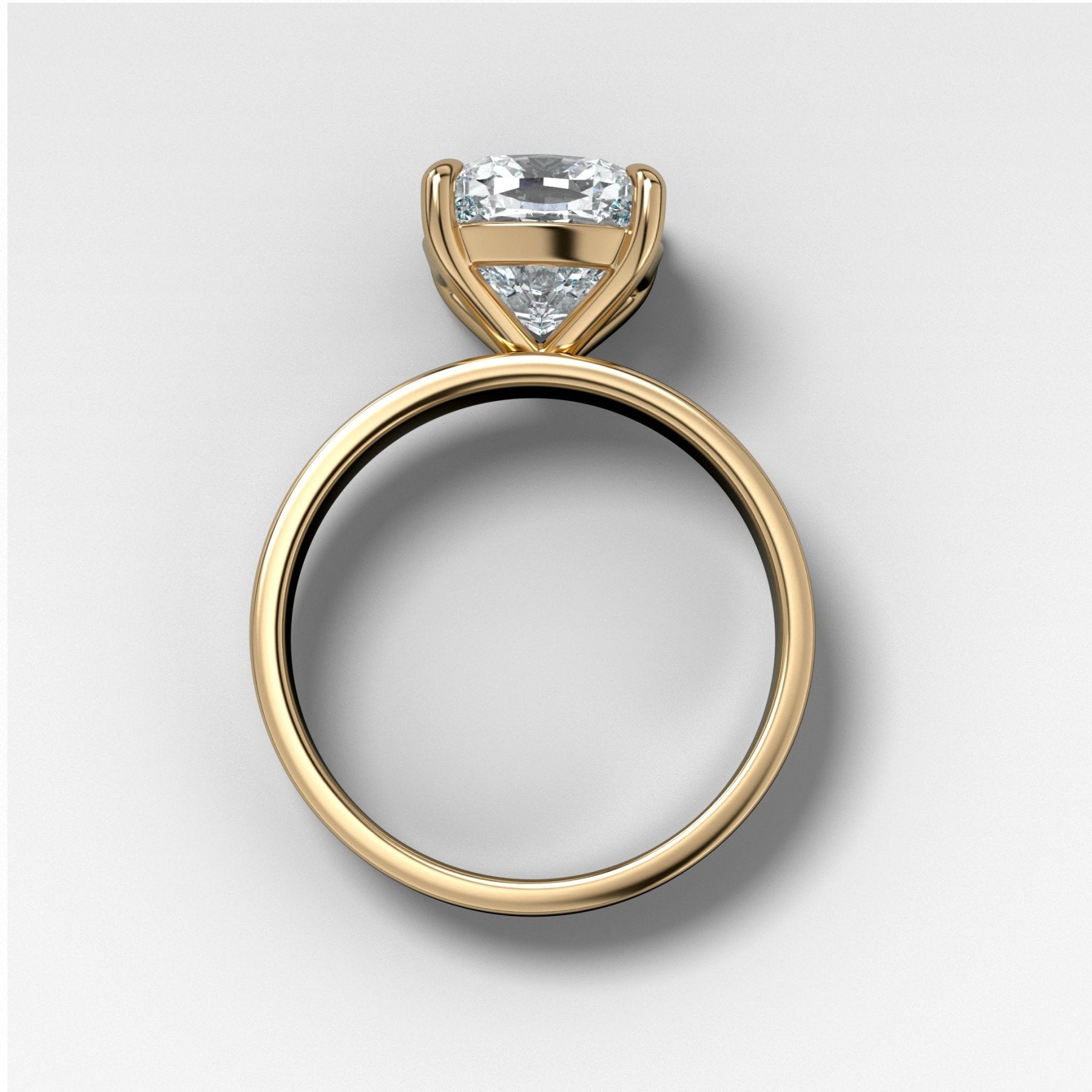 Finest Solitaire ring by GOODSTONE, showing rounded and polished prong tips on a cushion cut setting